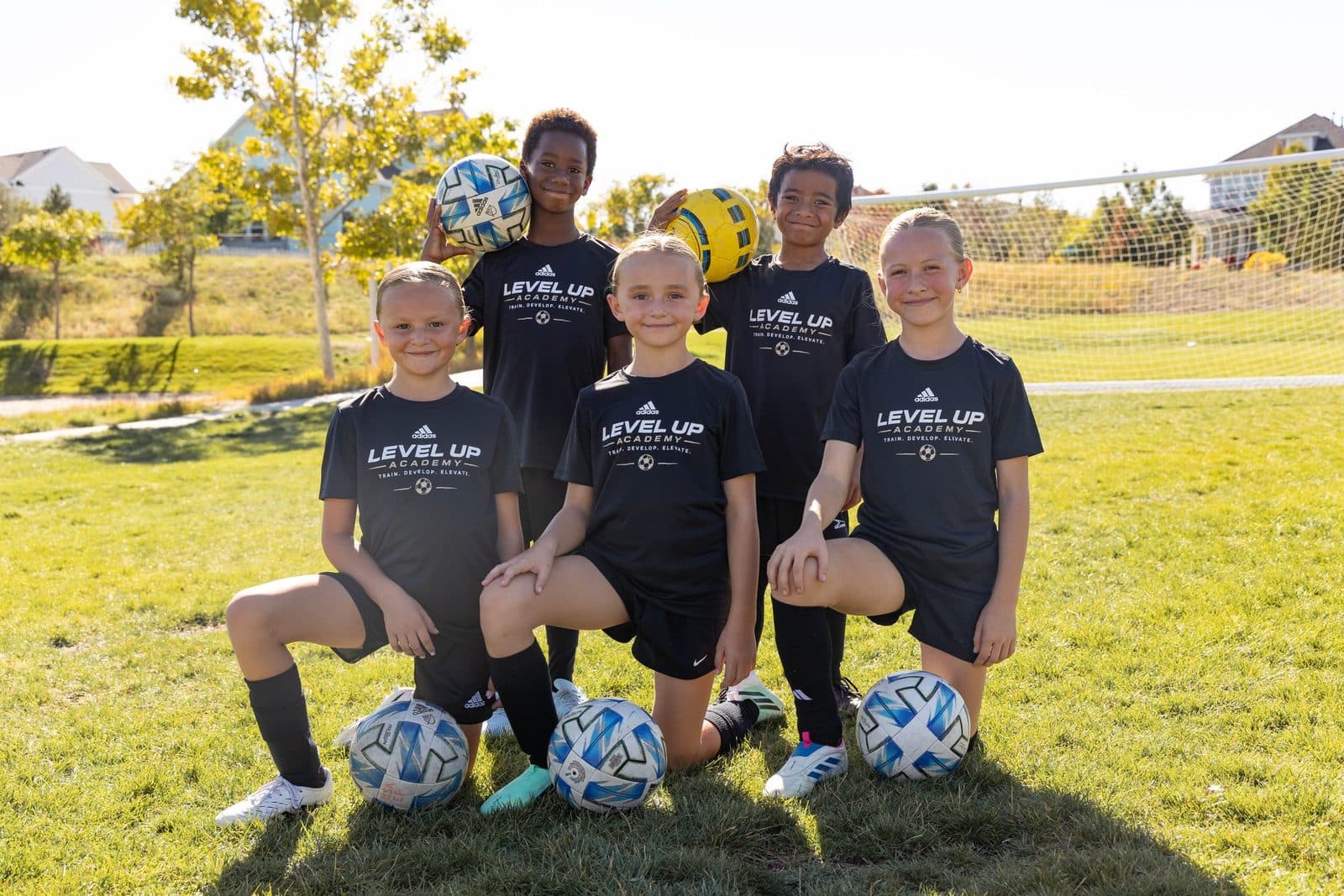 Five Level Up players in black training shirts